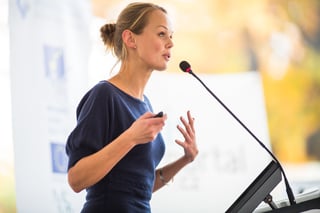 woman giving motivational speech