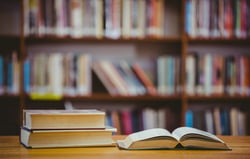 Books on desk in library at the elementary school-1