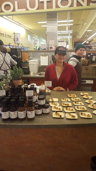 Lisa Tran at New Seasons demoing her sauces created in Getting Your Recipe to Market.jpg